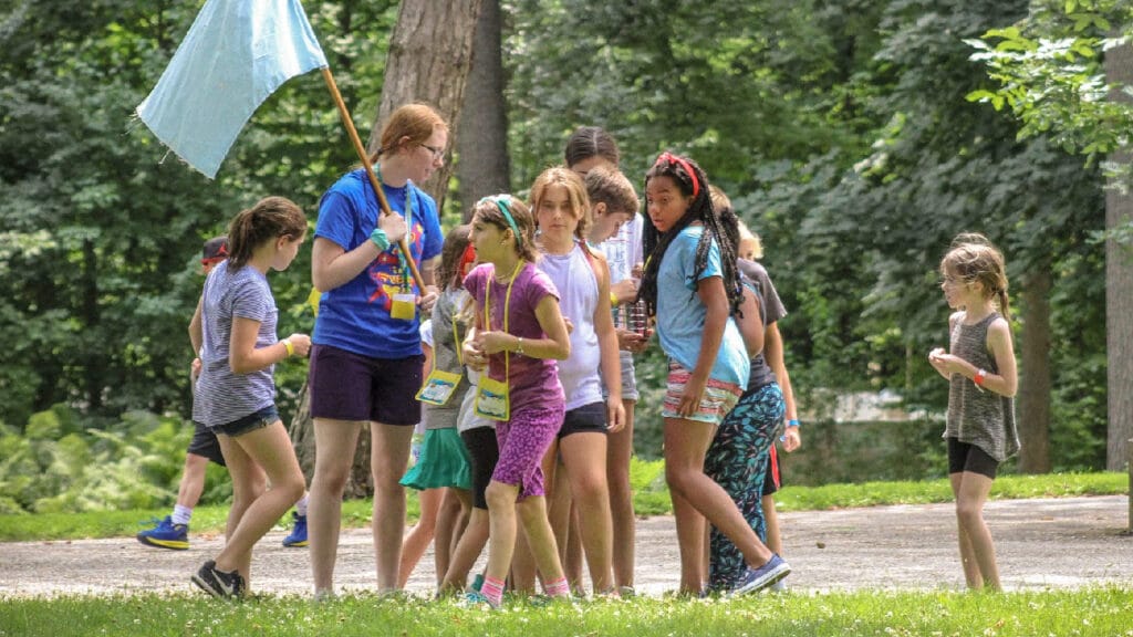 Campers in a team huddle.